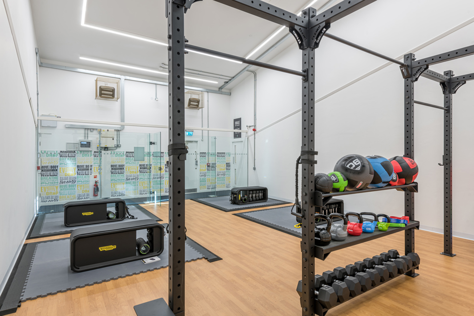 Exhale fitness studio with benches and free weights